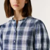 Blusa a cuadros con volantes