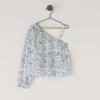 Blusa asimétrica con estampado floral