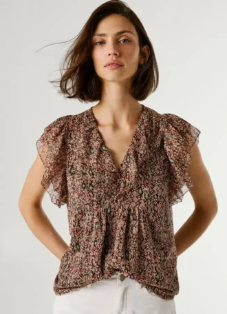 Blusa con cuello en V y volantes