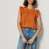 Blusa con detalles plisados Blusa con detalles plisados