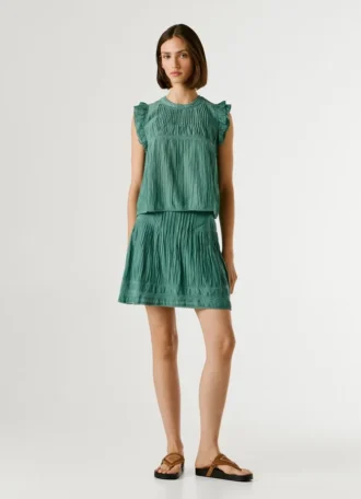 Blusa con detalles plisados