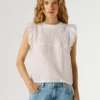 Blusa con detalles plisados