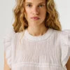 Blusa con detalles plisados