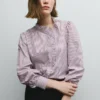 Blusa de popelín con volantes Blusa de popelín con volantes