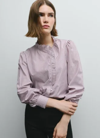 Blusa de popelín con volantes