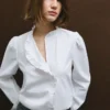 Blusa de popelín con volantes Blusa de popelín con volantes