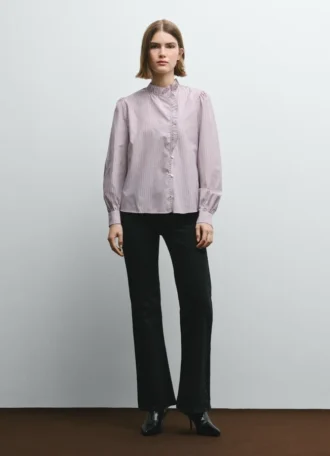 Blusa de popelín con volantes