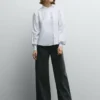 Blusa de popelín con volantes Blusa de popelín con volantes
