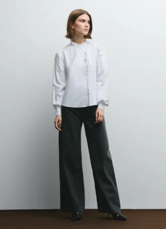 Blusa de popelín con volantes