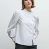 Blusa de popelín con volantes Blusa de popelín con volantes
