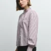 Blusa de popelín con volantes Blusa de popelín con volantes