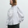 Blusa de popelín con volantes Blusa de popelín con volantes