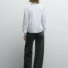 Blusa de popelín con volantes Blusa de popelín con volantes