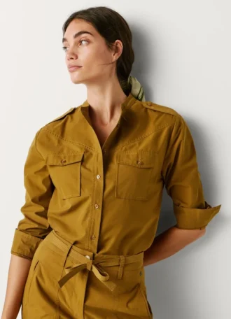 Blusa fluida con bolsillos