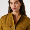 Blusa fluida con bolsillos Blusa fluida con bolsillos