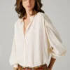 Blusa fluida con cuello mao Blusa fluida con cuello mao