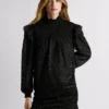 Blusa fluida con detalles metalizados Blusa fluida con detalles metalizados