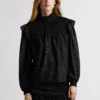 Blusa fluida con detalles metalizados Blusa fluida con detalles metalizados