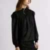 Blusa fluida con detalles metalizados Blusa fluida con detalles metalizados
