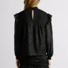 Blusa fluida con detalles metalizados Blusa fluida con detalles metalizados