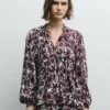 Blusa fluida con estampado floral