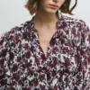Blusa fluida con estampado floral