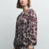 Blusa fluida con estampado floral