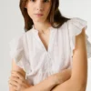 Blusa fluida con mangas de mariposa
