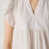 Blusa fluida con mangas de mariposa