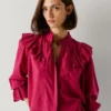 Blusa fluida con volantes