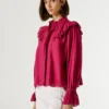 Blusa fluida con volantes