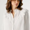 Blusa fluida con volantes Blusa fluida con volantes