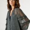 Blusa semitransparente con volantes Blusa semitransparente con volantes