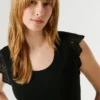 Blusa sin mangas de punto elástico Blusa sin mangas de punto elástico