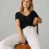 Bolso bandolera con solapa efecto piel
