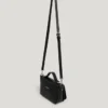 Bolso bandolera con solapa efecto piel