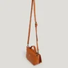 Bolso bandolera con solapa efecto piel