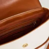 Bolso de hombro combinado con solapa Bolso de hombro combinado con solapa