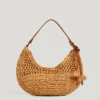 Bolso de rafia con forma de media luna