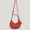 Bolso de rafia con forma de media luna Bolso de rafia con forma de media luna
