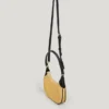 Bolso de rafia con forma de media luna Bolso de rafia con forma de media luna