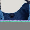 Bolso de rafia con forma de media luna