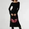 Bolso en forma de media luna con efecto piel Bolso en forma de media luna con efecto piel