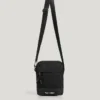 Bolso tipo reporter con correa ajustable