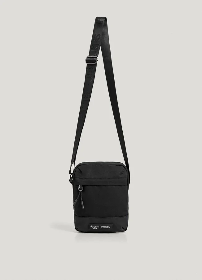 Bolso tipo reporter con correa ajustable