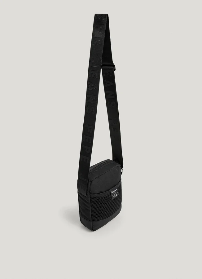 Bolso tipo reporter con correa ajustable