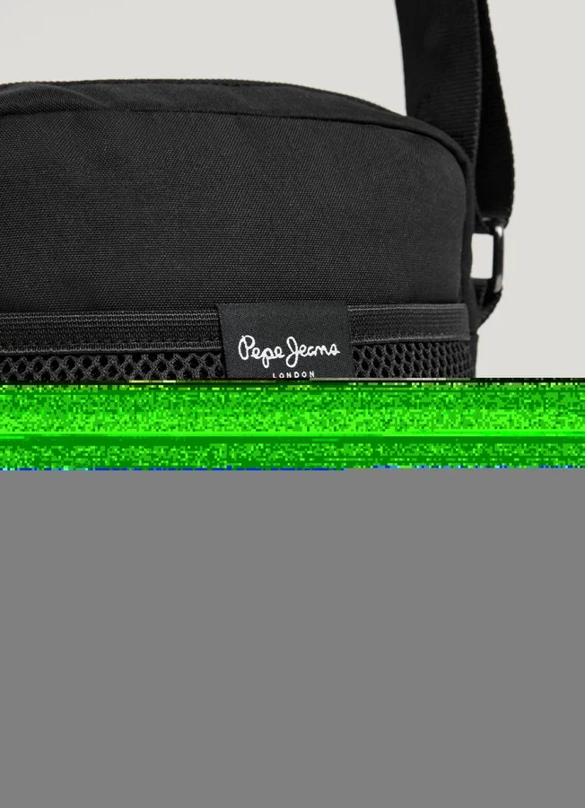 Bolso tipo reporter con correa ajustable
