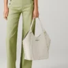 Bolso tote con efecto piel y tachuelas