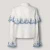 Camisa con volantes bordados