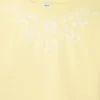 Camiseta de corte holgado con bordados florales